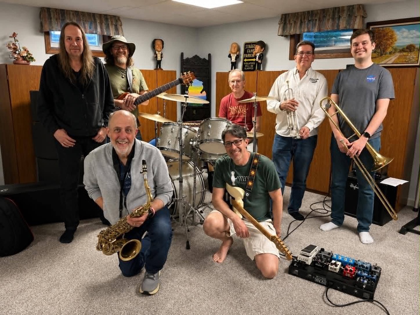 The seven members of Roundabout with their instruments